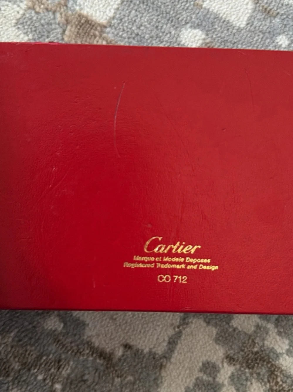Cartier Red and Gold original for glasses but bottom cushion is removed